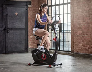 Upright exercise bikes